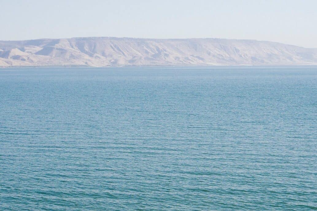 people walking on seashore of galilee one of the most famous biblical sites