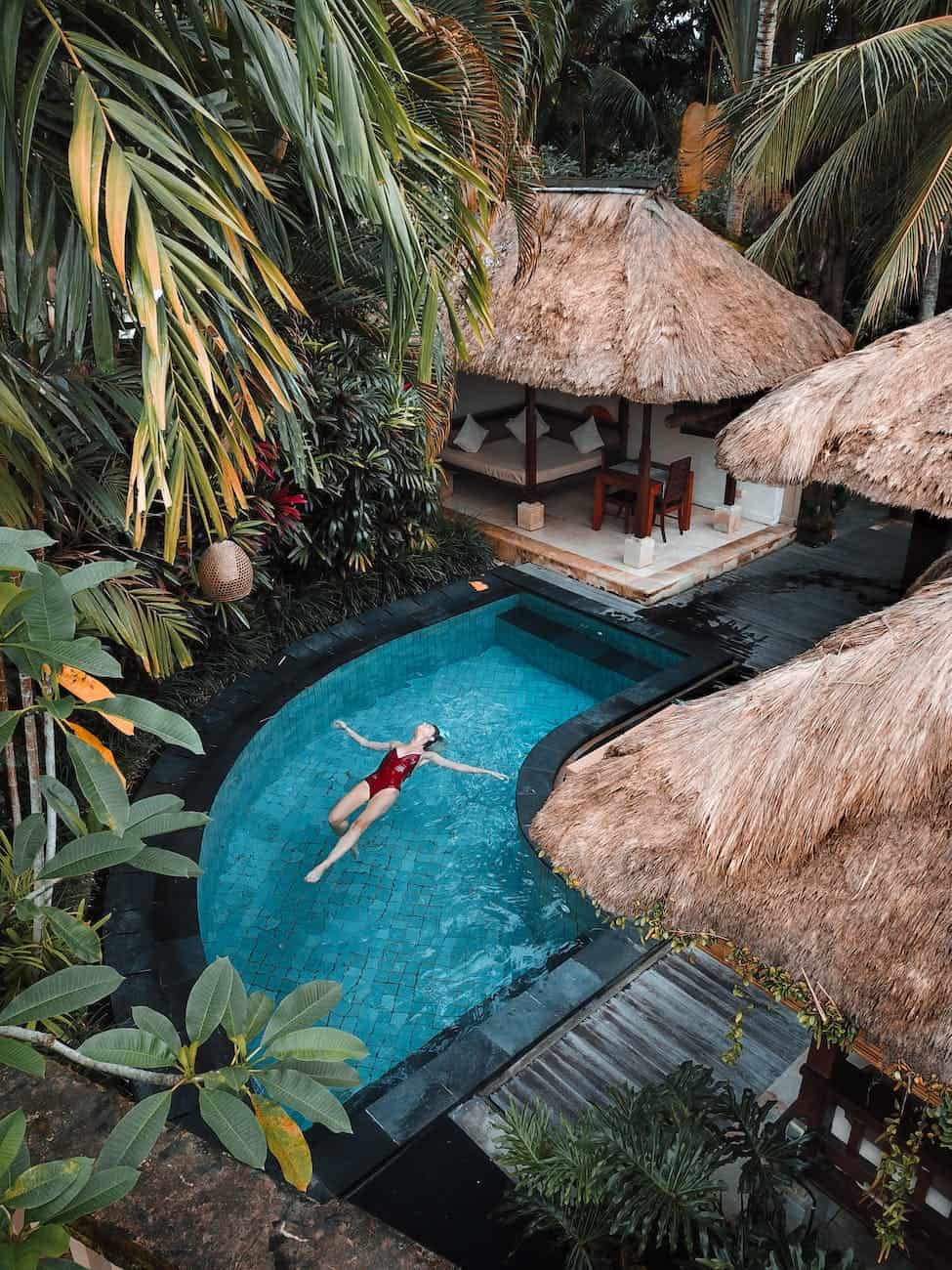 woman soaking on the swimming pool in ubud. How to spend 4 days in ubud