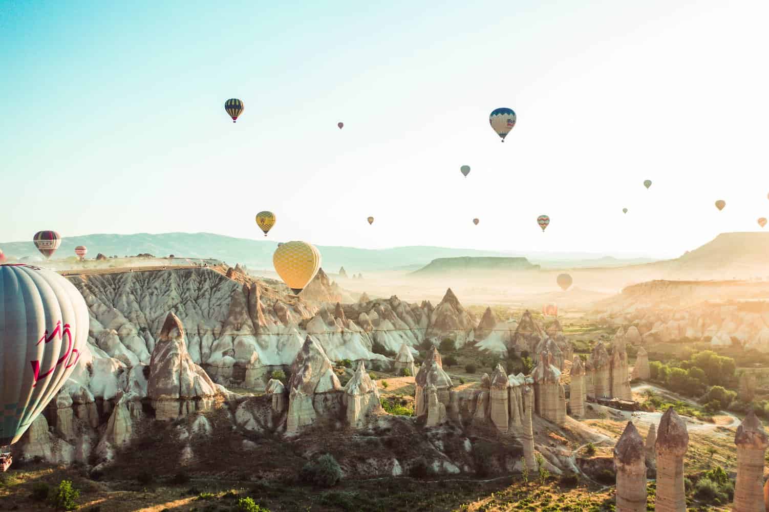 photo of hot air balloons on flight in cappadocia. one of the 16 biblical sites in turkey