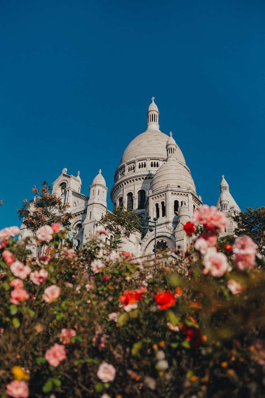 the basilica of the sacred heart of paris under blue sky