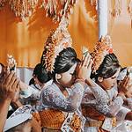 people in traditional wear holding a ceremony